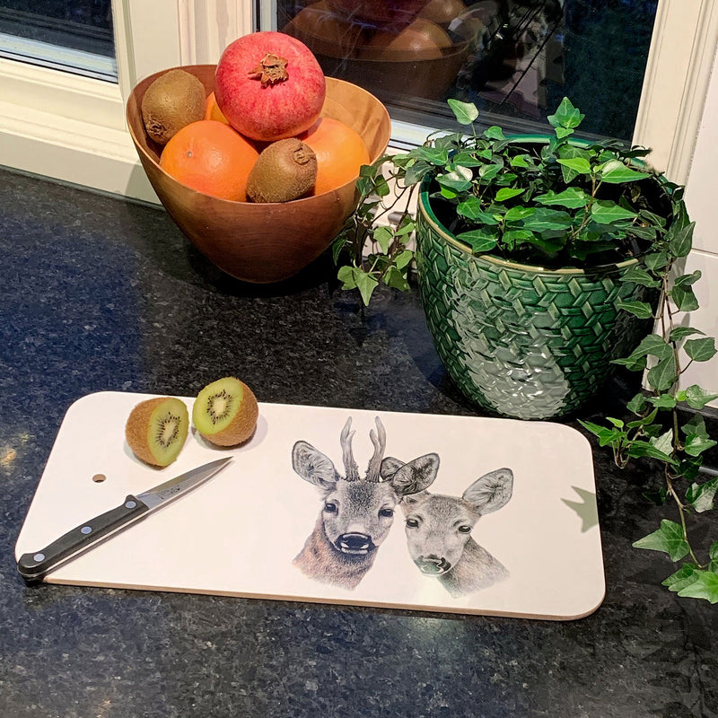 Cutting board with the deer couple Gustav & Veronica by Charlotte Nicolin